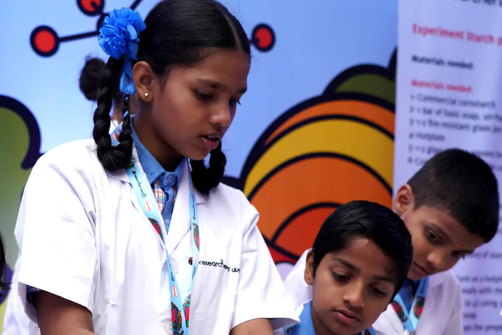 Henkel India Reasearchers World - Children learning about why glue sticks